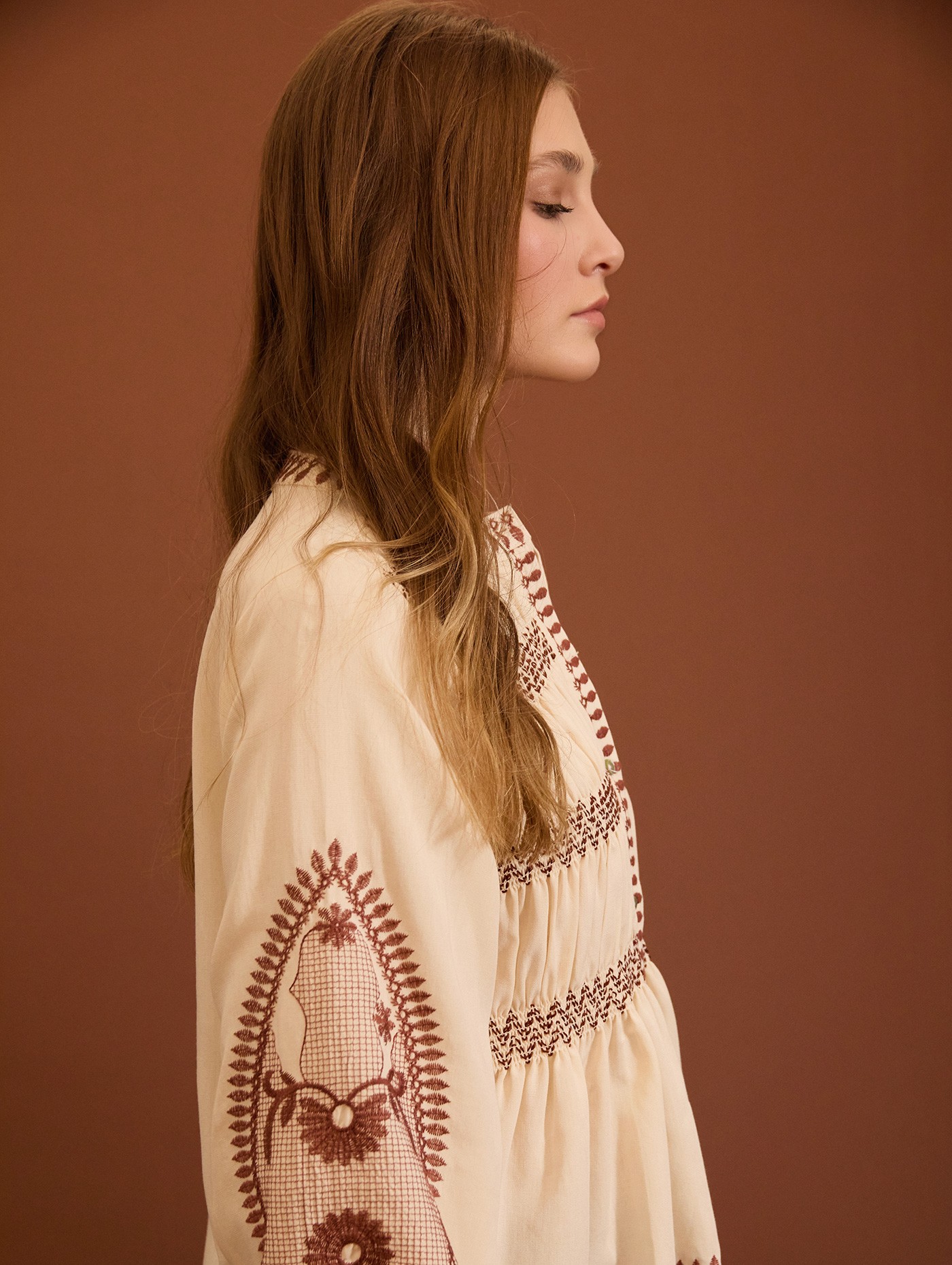Embroidered blouse with gathers