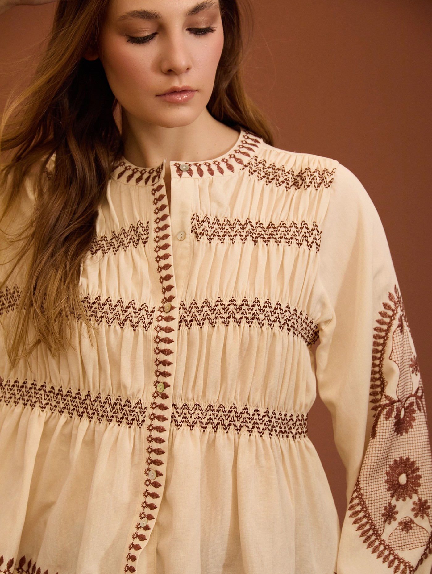 Embroidered blouse with gathers