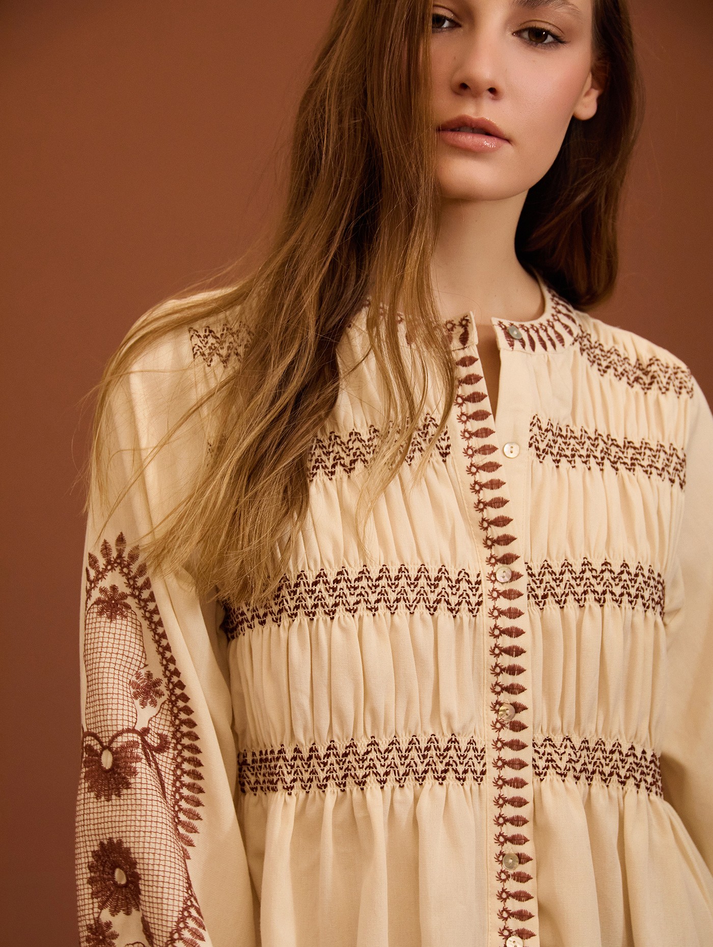 Embroidered blouse with gathers