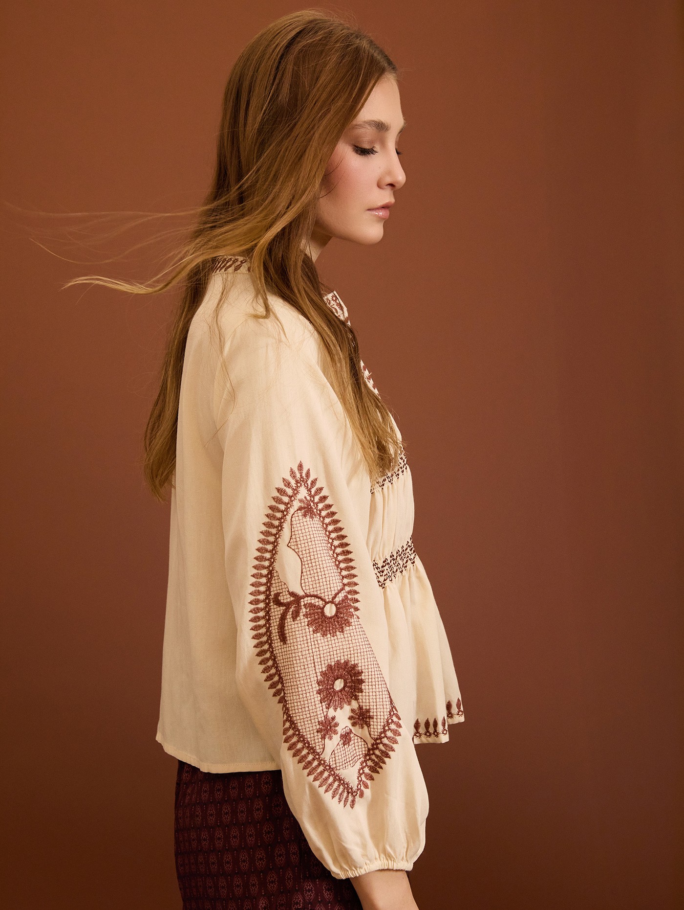Embroidered blouse with gathers