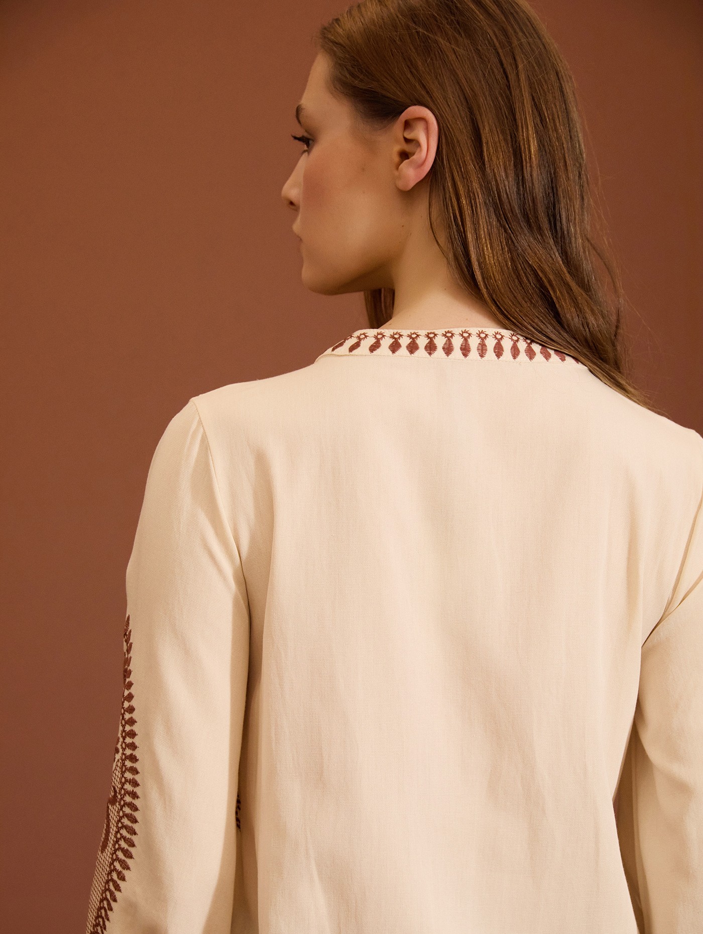 Embroidered blouse with gathers