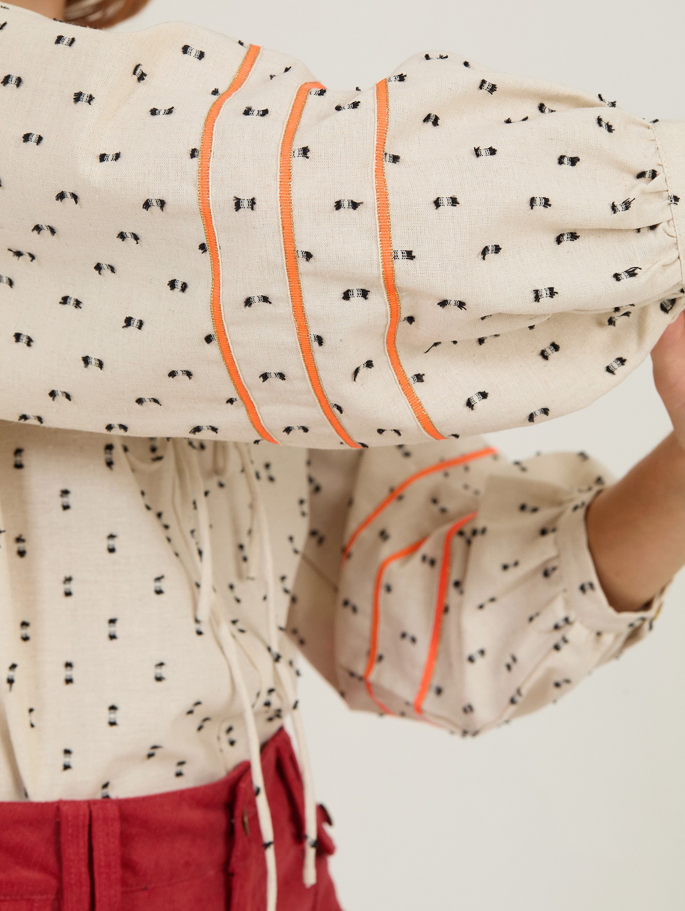 Blusa de plumeti con cintas 6