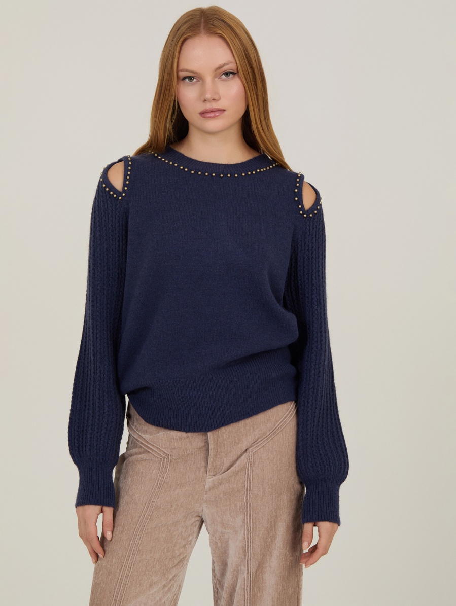 Jersey con bolitas doradas