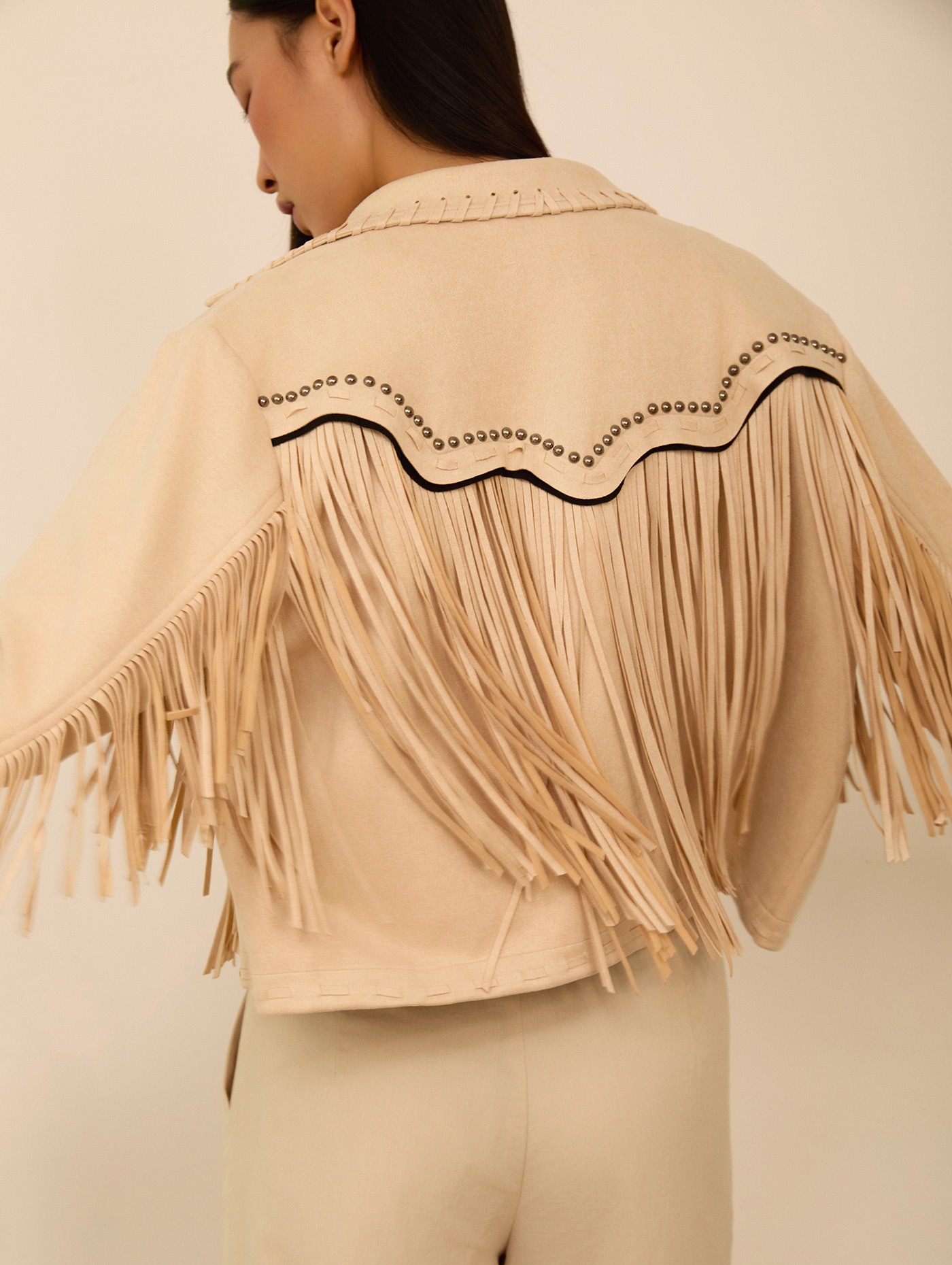 Cazadora de ante flecos