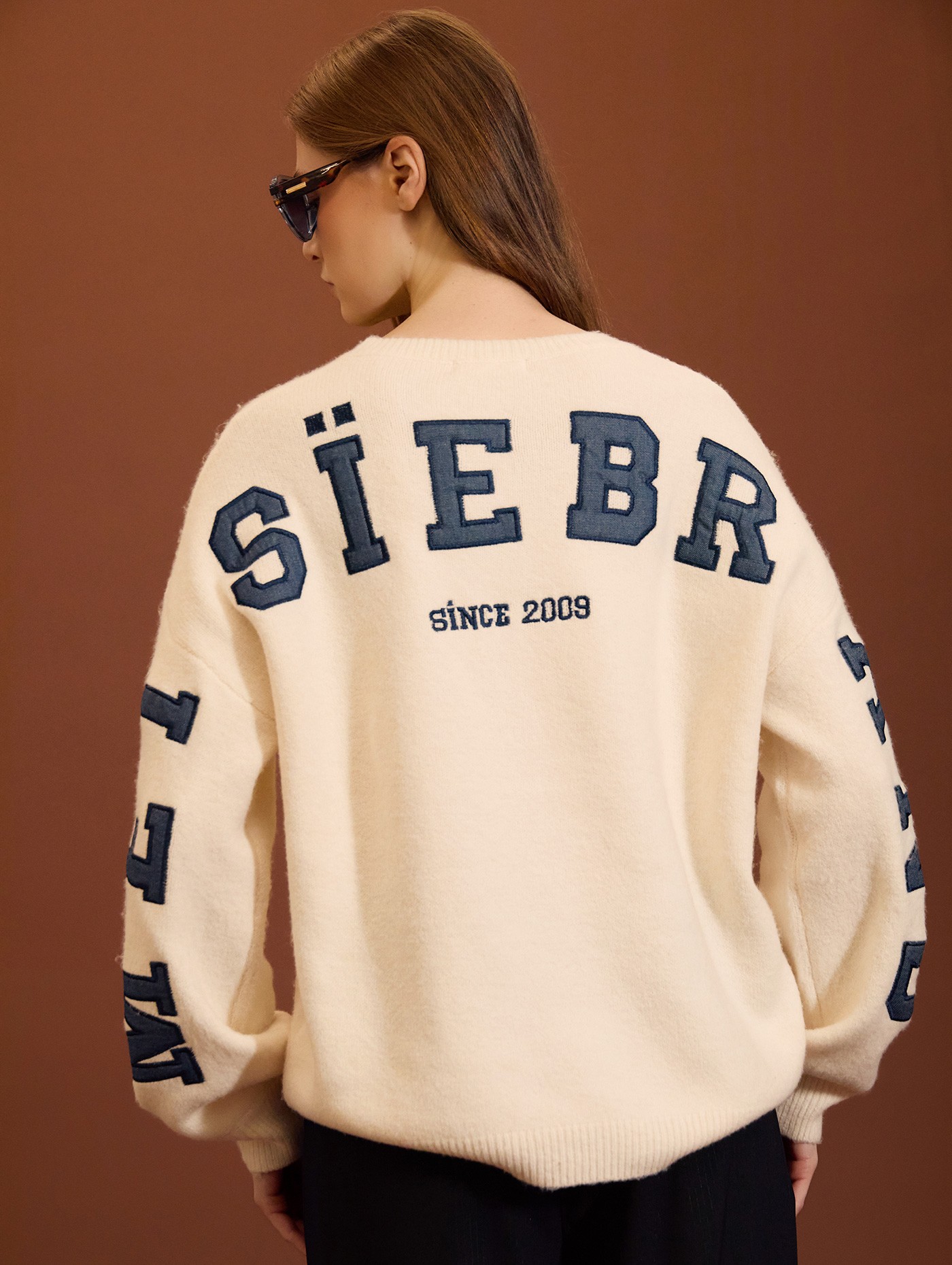 Jersey de punto con mensaje en denim